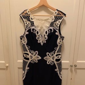 Blue cocktail dress with lace appliqué